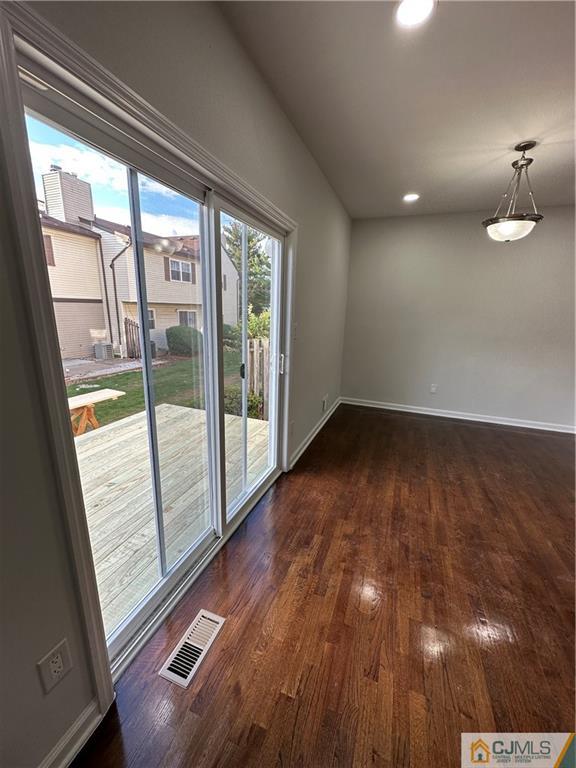 3605 Hana Road Edison, NJ 08817 - Photo 12 of 25 a view of empty room with wooden floor and fan