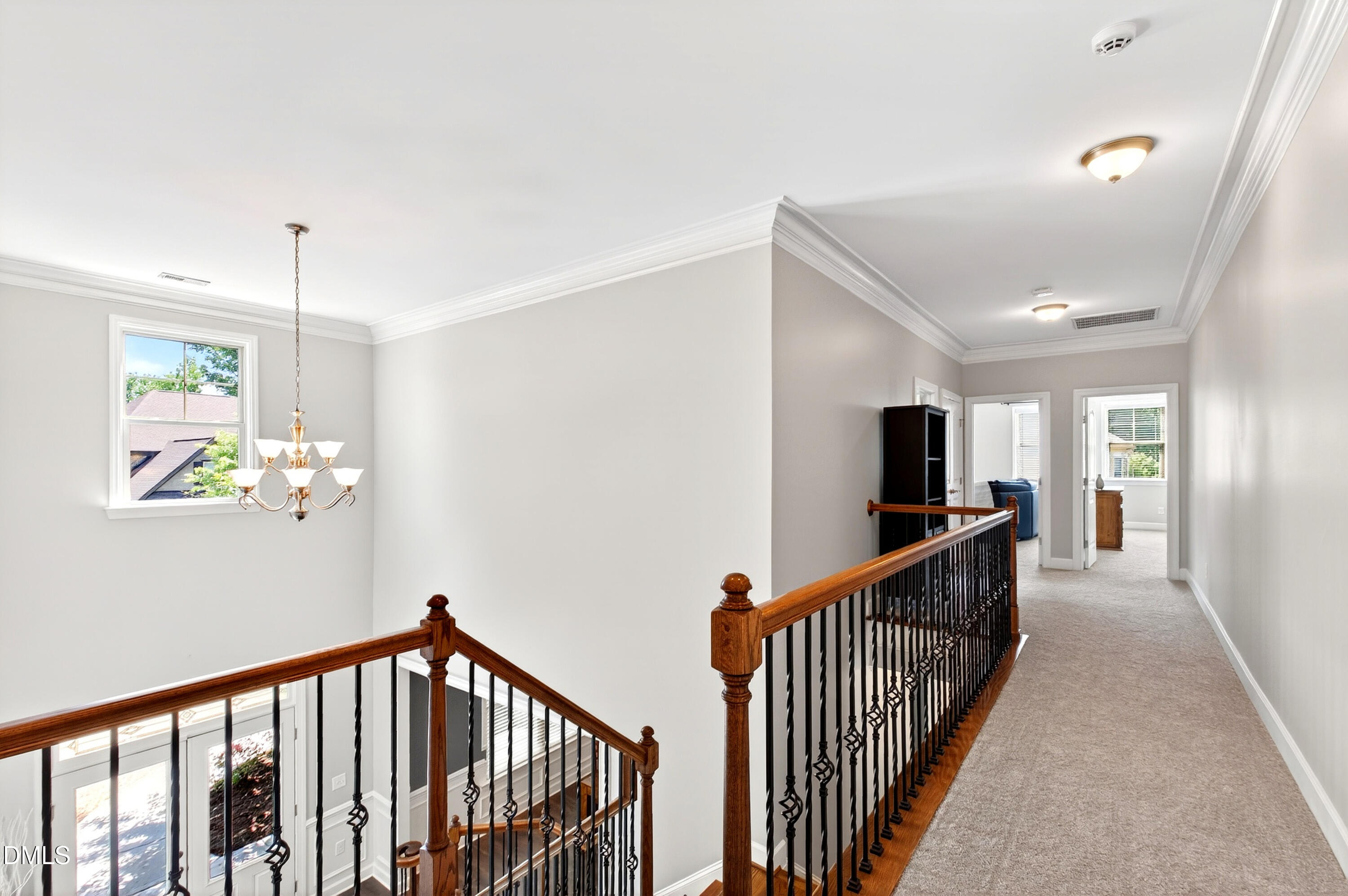 313 Karpen Lane Cary, NC 27519 - Photo 39 of 86 a view of a hallway with stairs