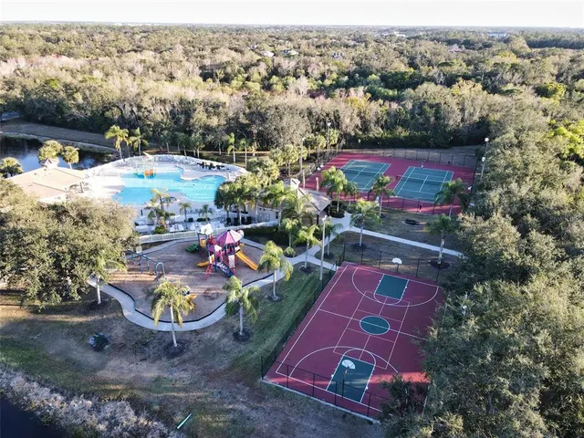 an aerial view of a house with a garden