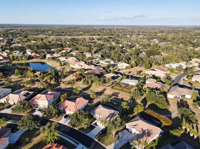 an aerial view of a city with lots of residential buildings