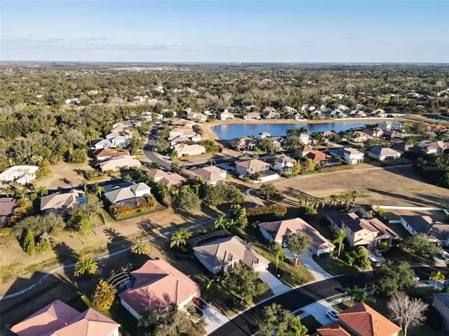 an aerial view of residential building with parking space