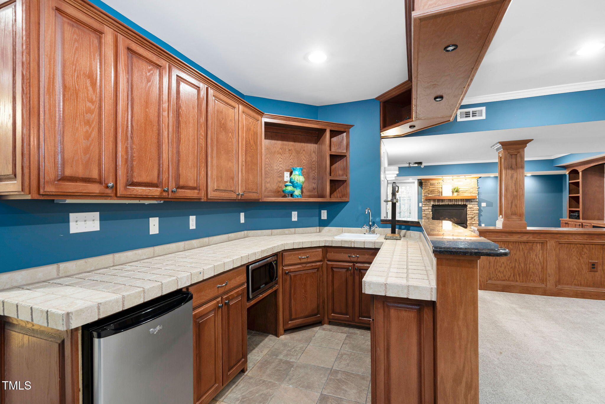 9320 Teton Pines Way Raleigh, NC 27617 - Photo 53 of 94 Basement bar & entertainment area