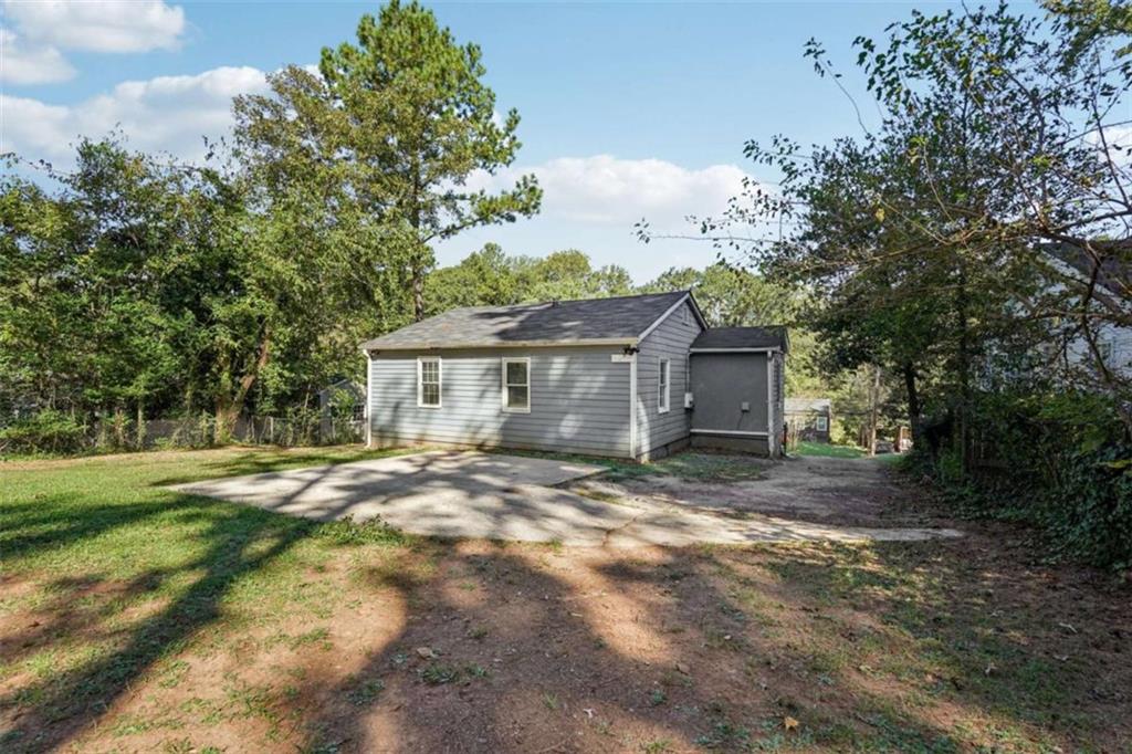 3465 Glen Road Decatur, GA 30032 - Photo 33 of 33 a view of a house with a yard