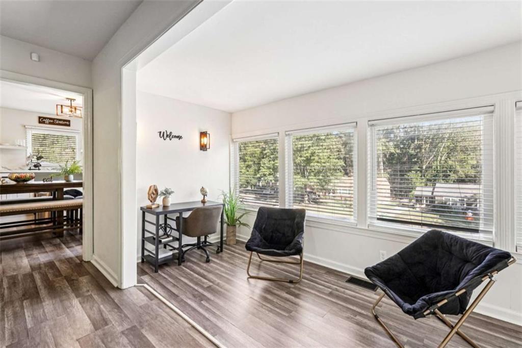3465 Glen Road Decatur, GA 30032 - Photo 5 of 33 a living room with furniture and a floor to ceiling window