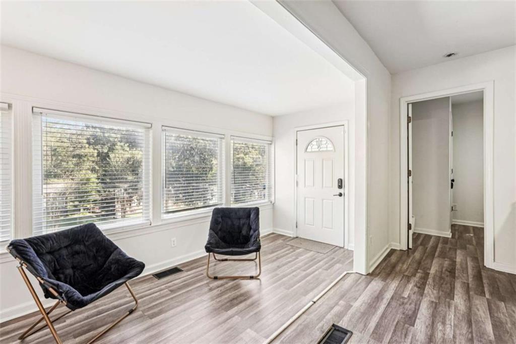 3465 Glen Road Decatur, GA 30032 - Photo 6 of 33 a living room with furniture and a floor to ceiling window