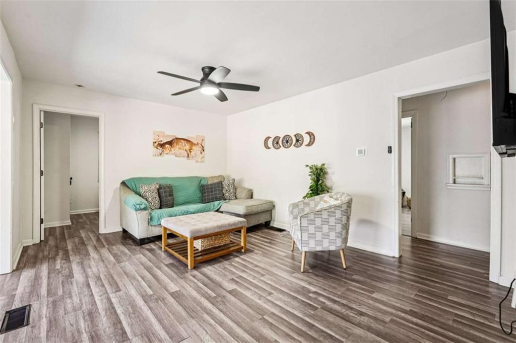 3465 Glen Road Decatur, GA 30032 - Photo 9 of 33 a living room with furniture and a wooden floor