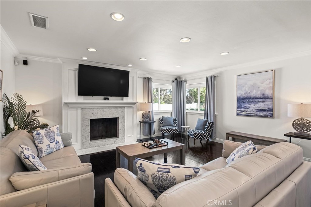 2219 Estribo Drive Rolling Hills Estates, CA 90274 - Photo 2 of 58 a living room with furniture and a flat screen tv