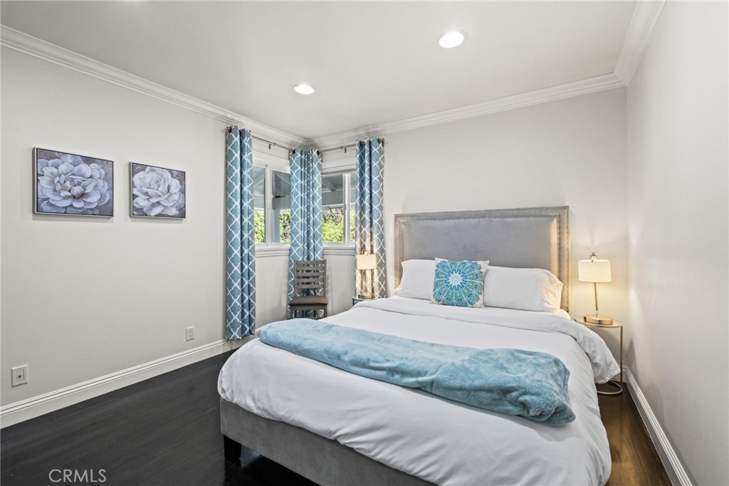 2219 Estribo Drive Rolling Hills Estates, CA 90274 - Photo 26 of 58 a bedroom with a large bed and a window