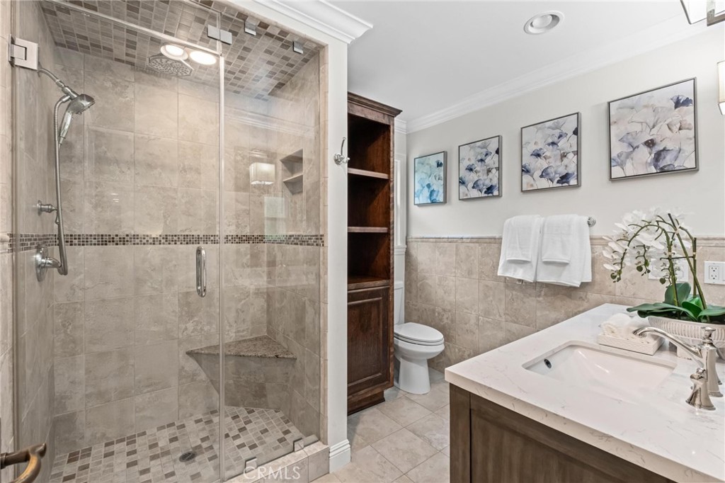 2219 Estribo Drive Rolling Hills Estates, CA 90274 - Photo 4 of 58 a bathroom with a sink toilet and shower