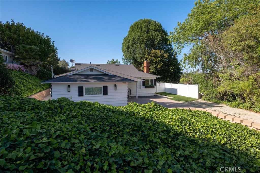 2219 Estribo Drive Rolling Hills Estates, CA 90274 - Photo 45 of 58 a view of a house with a yard and large trees