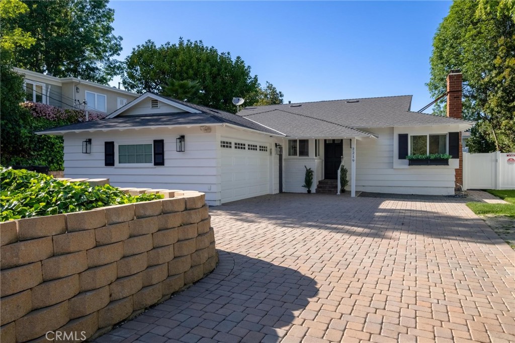 2219 Estribo Drive Rolling Hills Estates, CA 90274 - Photo 46 of 58 a front view of a house with a yard
