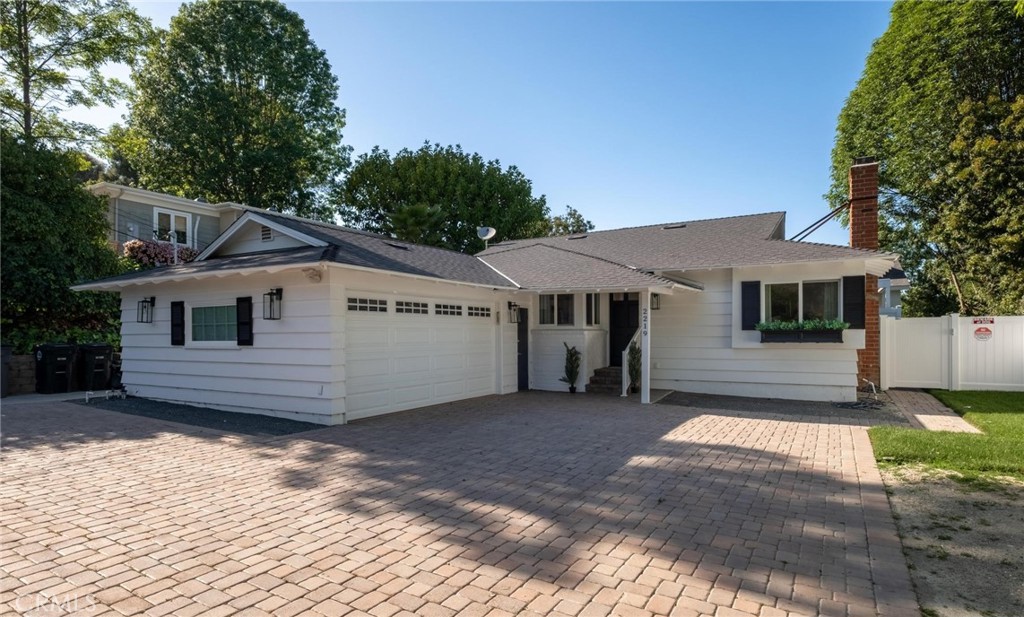 2219 Estribo Drive Rolling Hills Estates, CA 90274 - Photo 6 of 58 a house with trees in the background