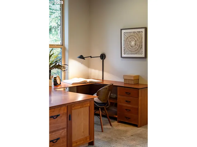 a bedroom with a bed and a bookshelf