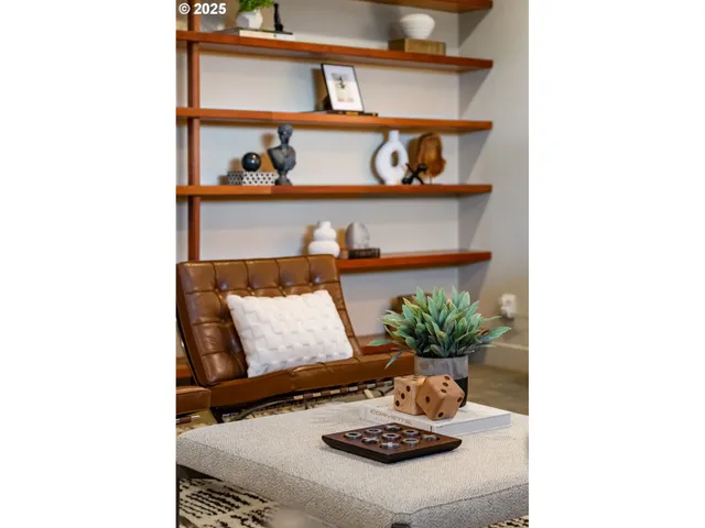 a table with a rug and a potted plant