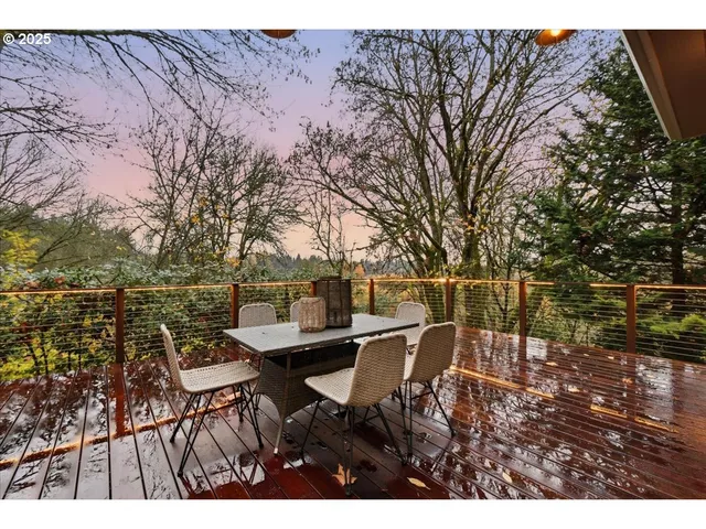 a view of a chairs and table on the terrace