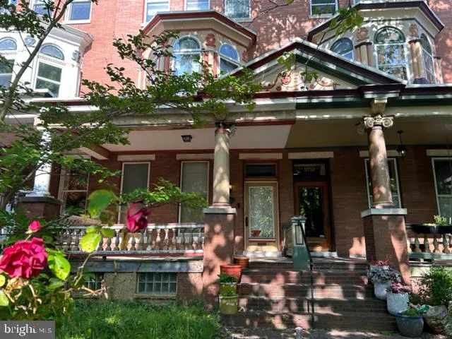a view of a cafe with sitting area