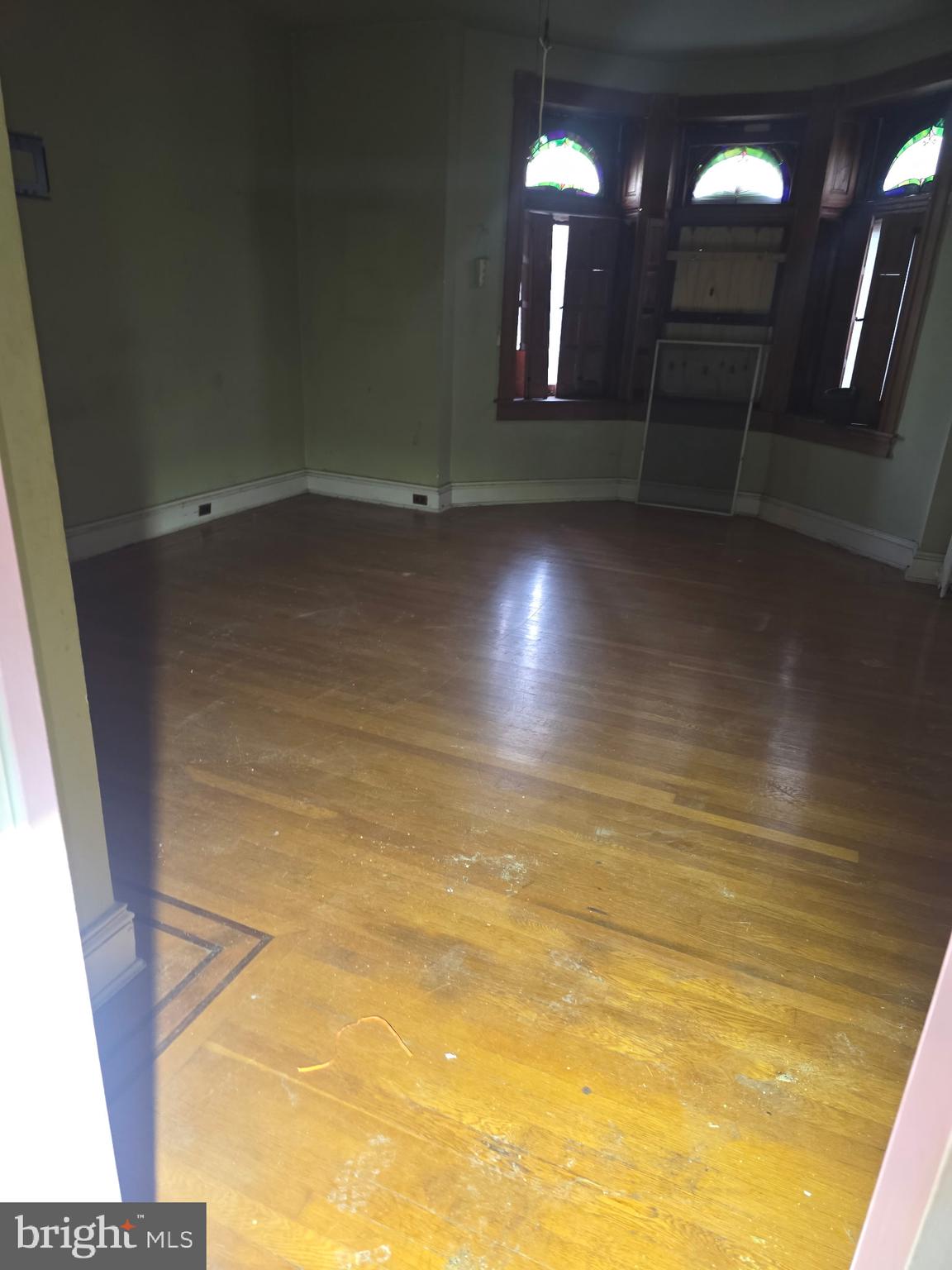 2721 North Calvert Street Baltimore, MD 21218 - Photo 14 of 29 a view of an empty room with glass door