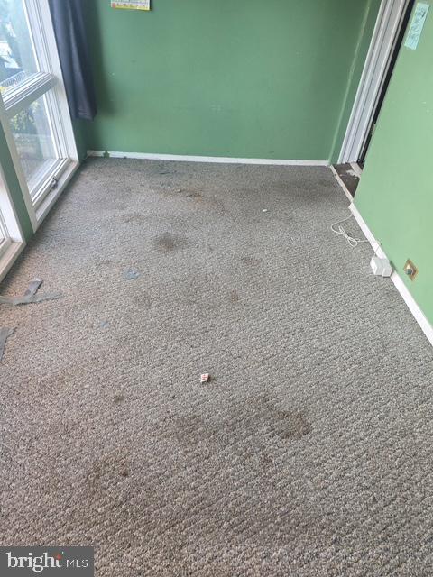 2721 North Calvert Street Baltimore, MD 21218 - Photo 17 of 29 a view of an empty room with a window