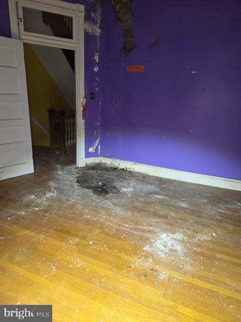 2721 North Calvert Street Baltimore, MD 21218 - Photo 19 of 29 a view of a building with a yard