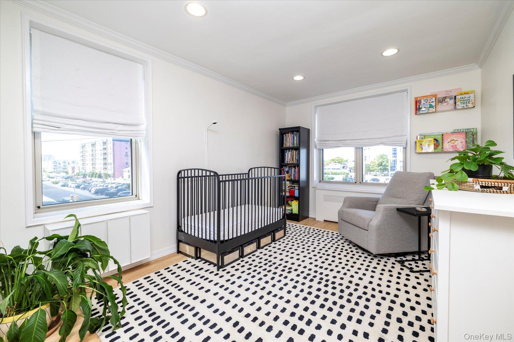 410 East Broadway, Unit 3E Long Beach, NY 11561 - Photo 14 of 23 a living room with furniture and a window