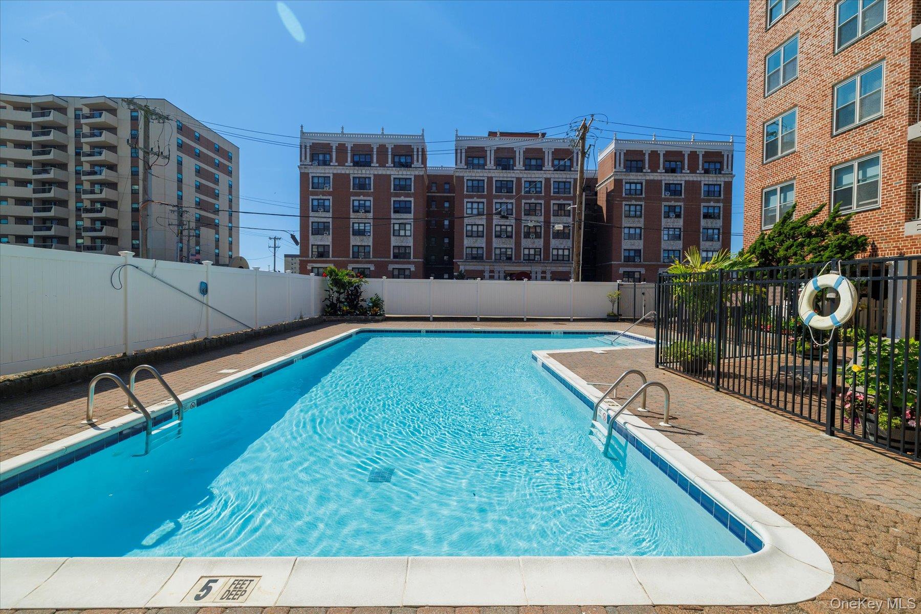 410 East Broadway, Unit 3E Long Beach, NY 11561 - Photo 18 of 23 a swimming pool with outdoor view