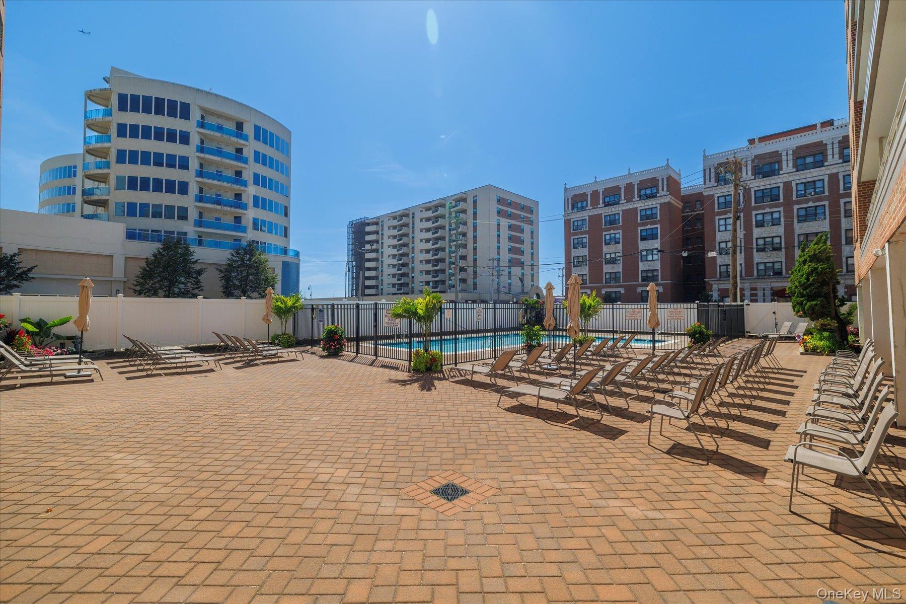 410 East Broadway, Unit 3E Long Beach, NY 11561 - Photo 19 of 23 a view of a building with sitting area
