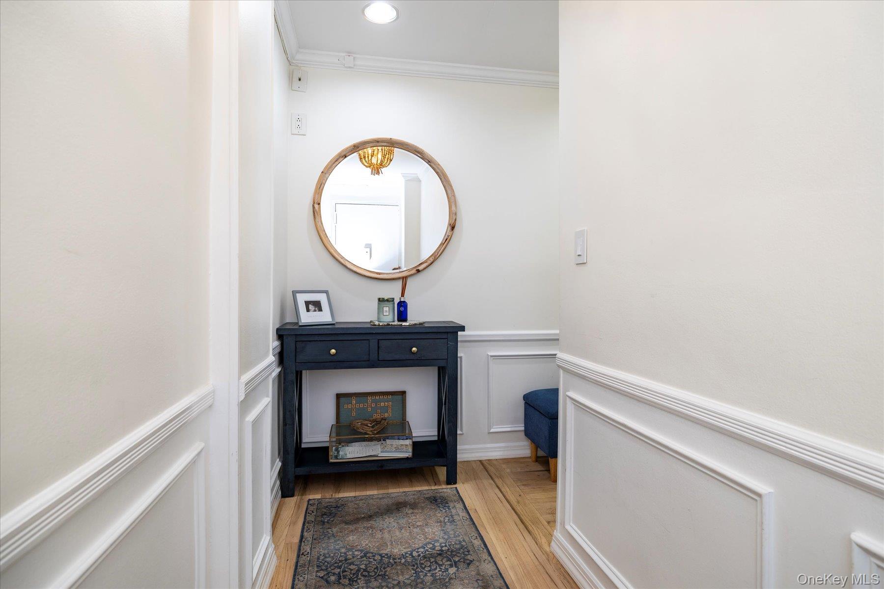 410 East Broadway, Unit 3E Long Beach, NY 11561 - Photo 5 of 23 a living room with a table and a fireplace