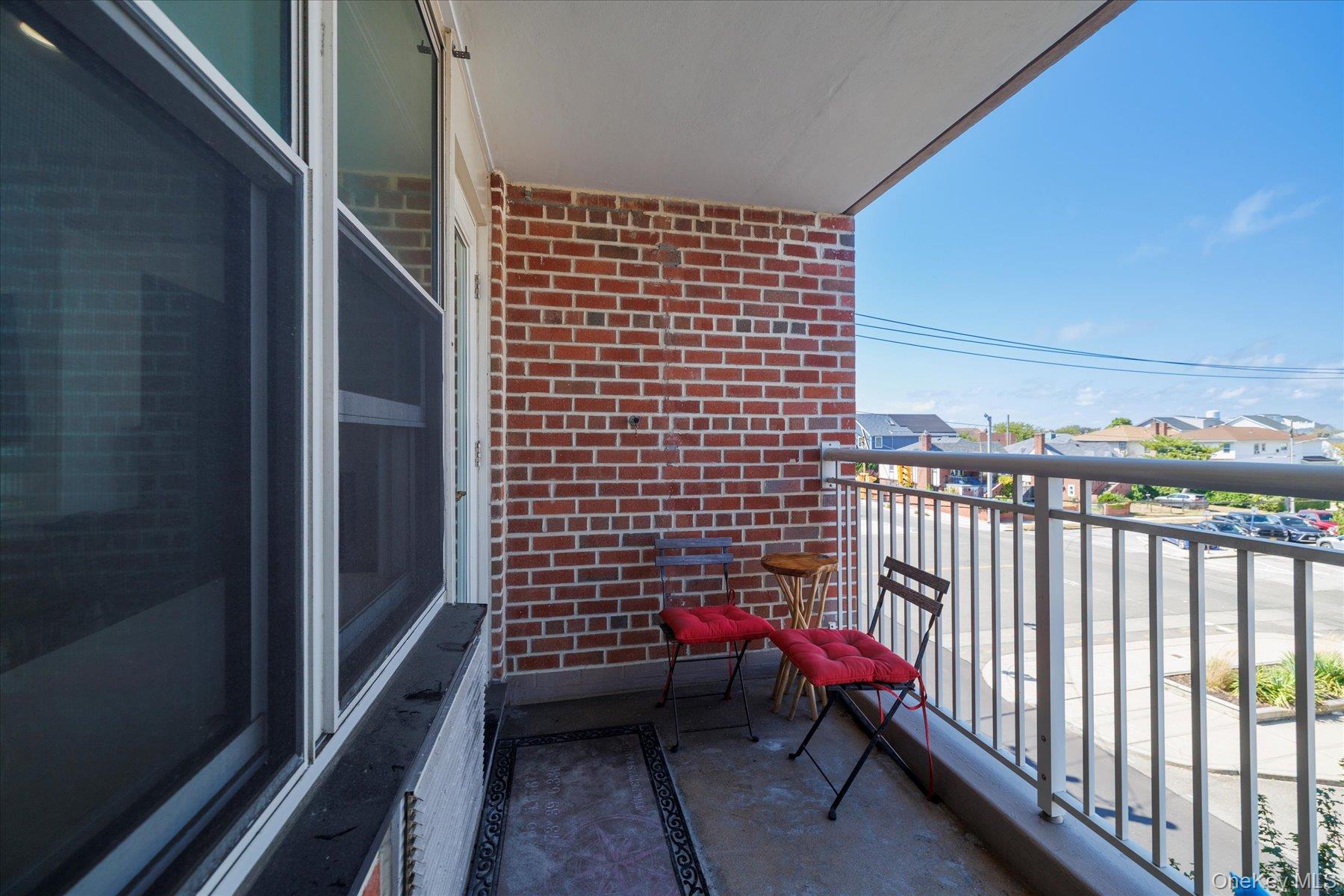 410 East Broadway, Unit 3E Long Beach, NY 11561 - Photo 6 of 23 a view of a balcony with chairs