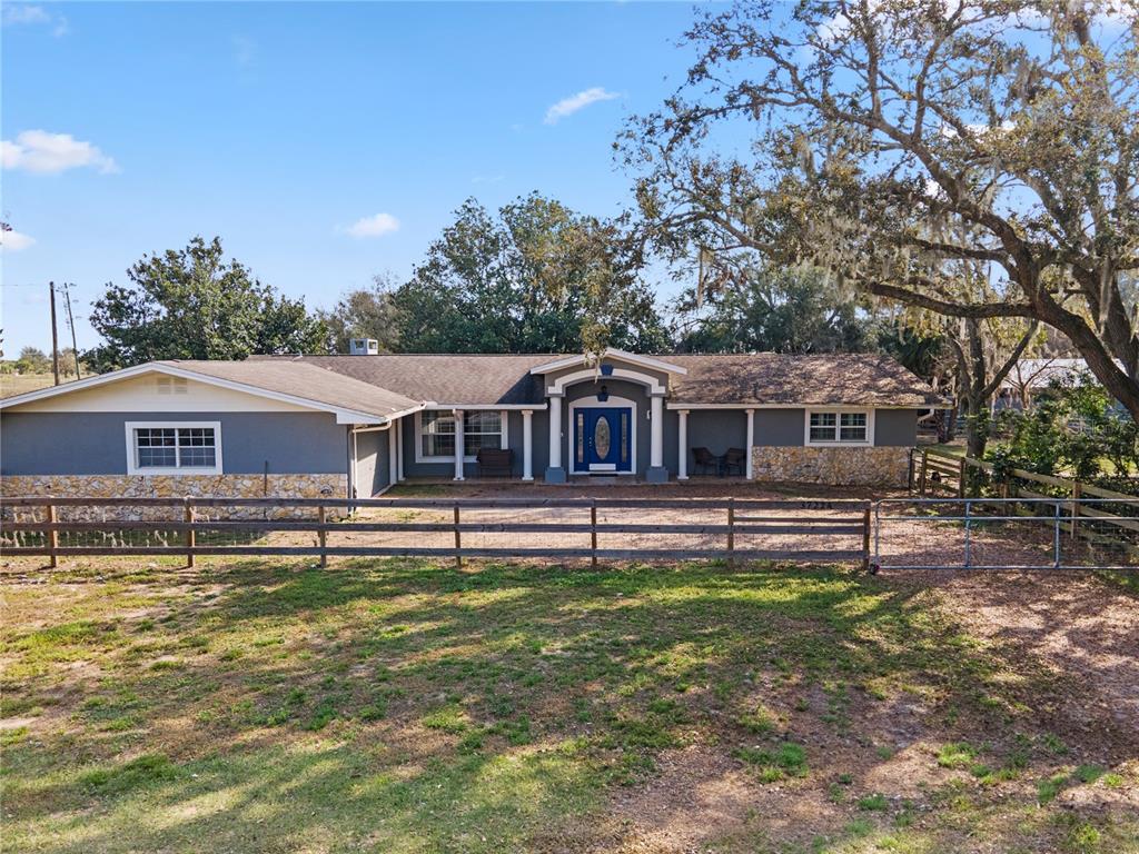 37224 Apiary Road Grand Island, FL 32735 - Photo 1 of 1 a view of a house with a yard