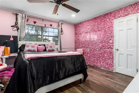 a bathroom with a granite countertop sink toilet and mirror