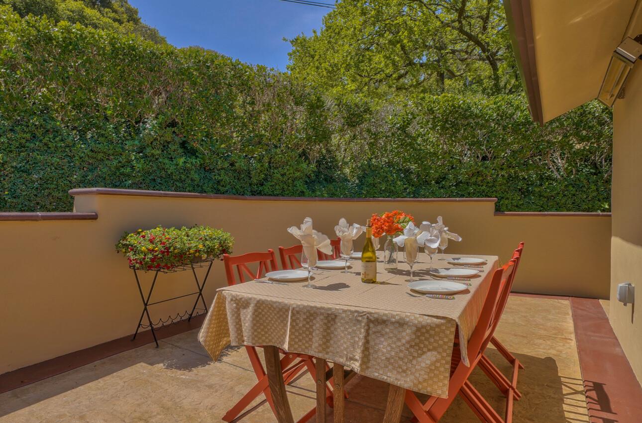 190 San Benancio Road Salinas, CA 93908 - Photo 13 of 61 a view of table and chair with potted plants