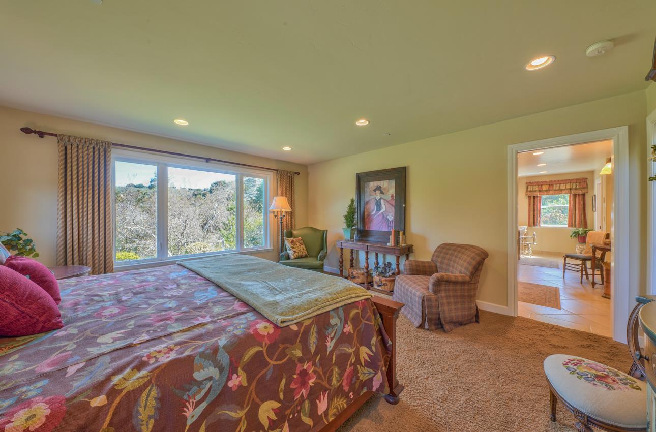 190 San Benancio Road Salinas, CA 93908 - Photo 34 of 61 a bedroom with a bed and wooden floor