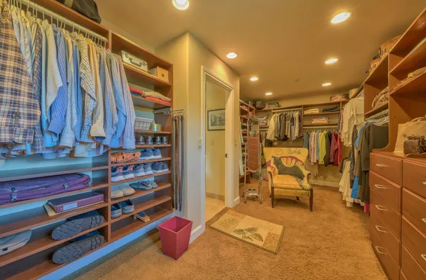 a bed room with a bed and a couch