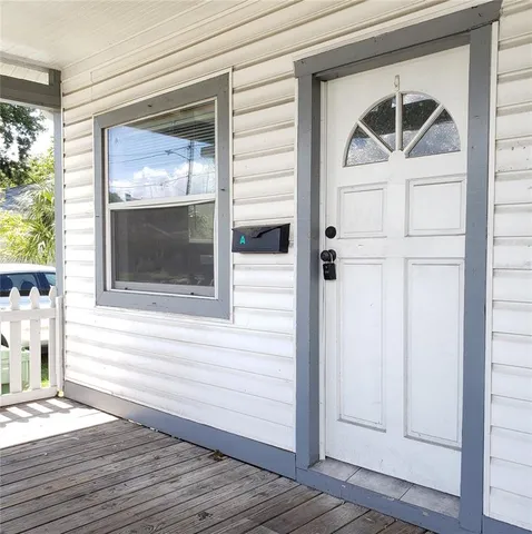 a front view of a house with a door