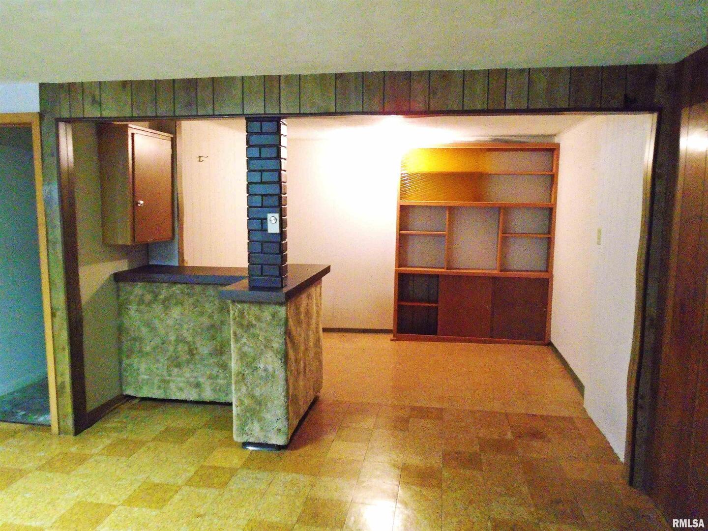 702 High Street Dixon, IA 52745 - Photo 7 of 16 a view of kitchen with front door