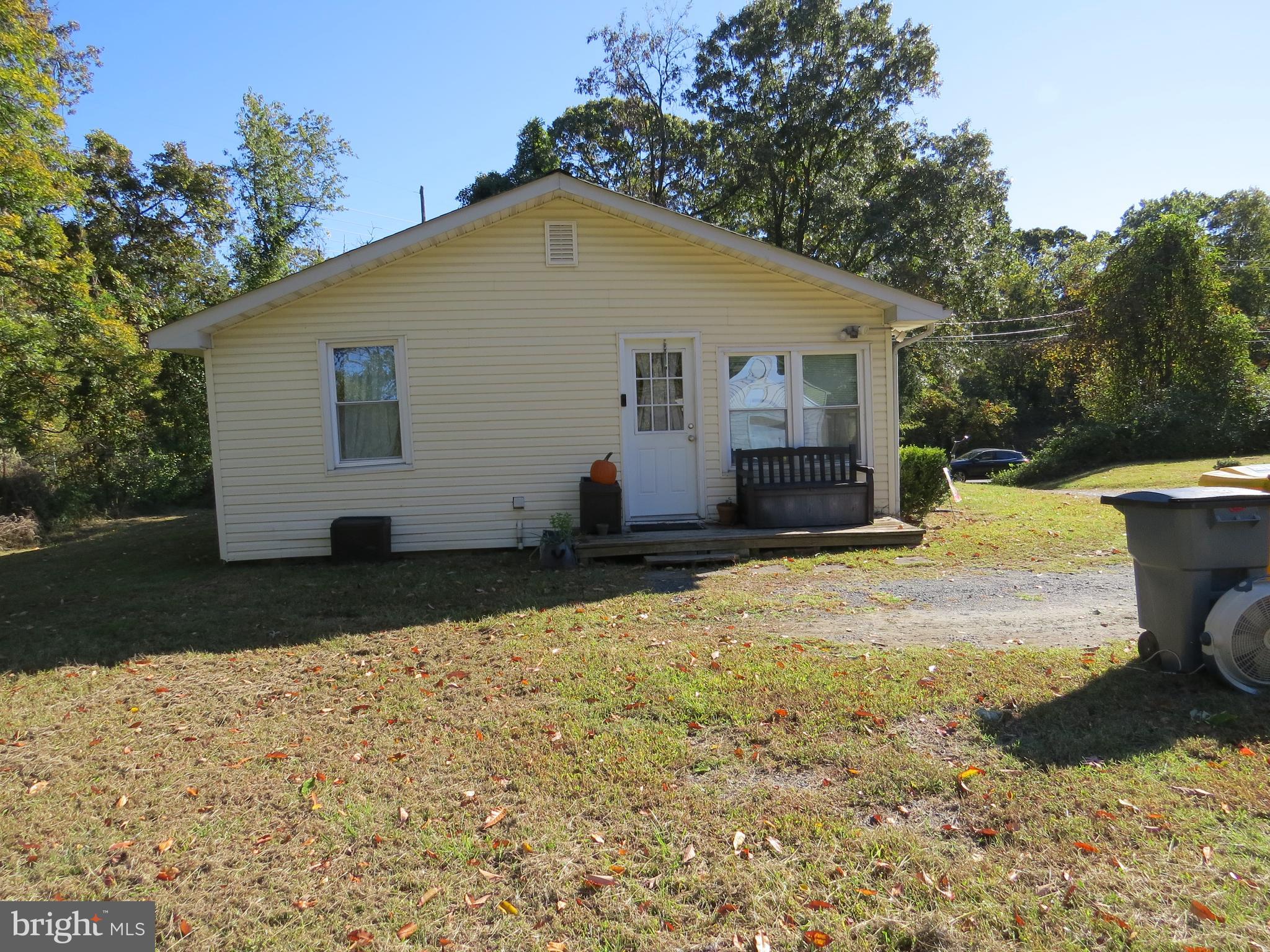 438 Burns Crossing Road Gambrills, MD 21054 - Photo 5 of 31 a view of a blue house with a yard