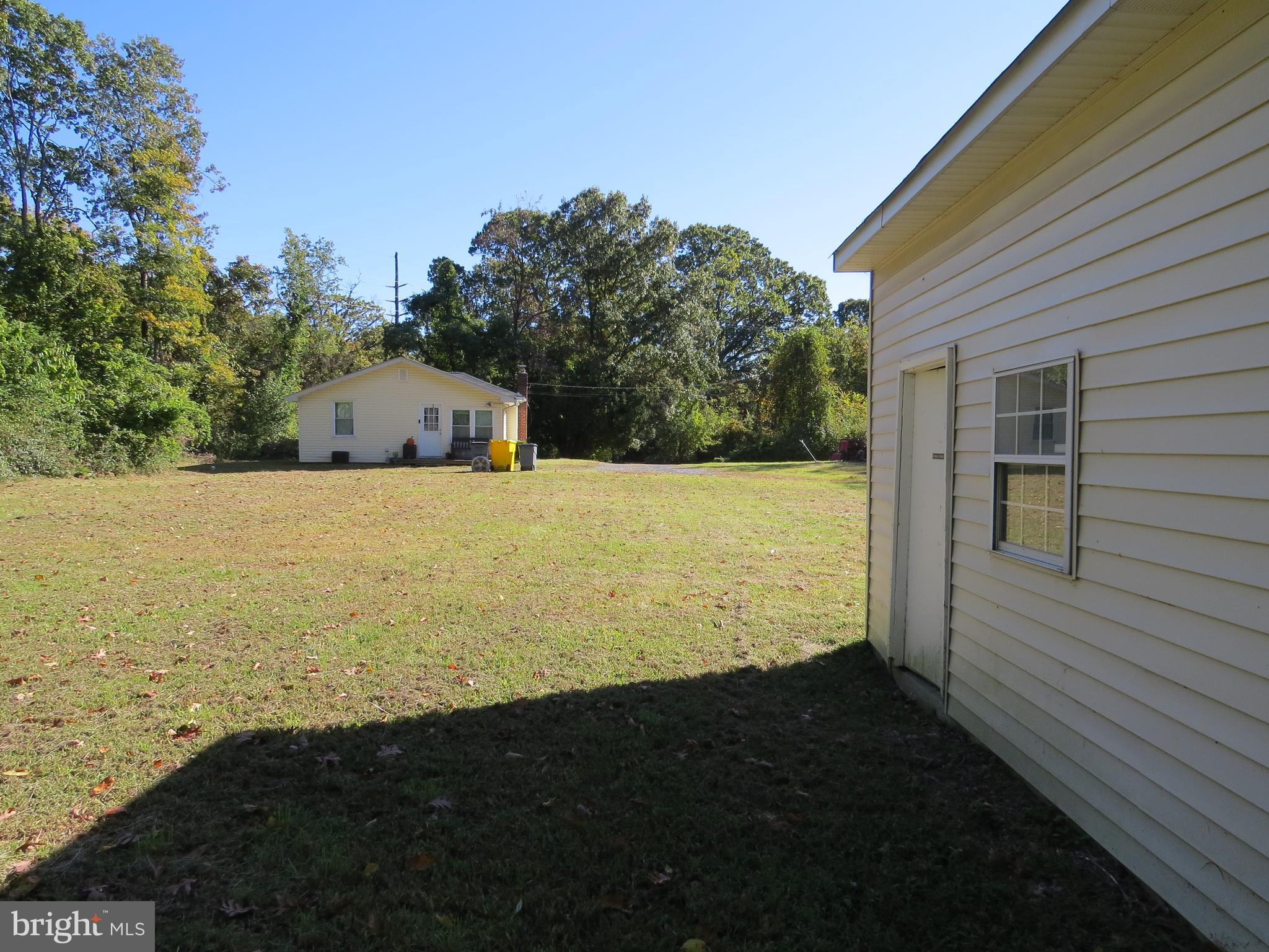 438 Burns Crossing Road Gambrills, MD 21054 - Photo 10 of 31 a view of back yard of the house