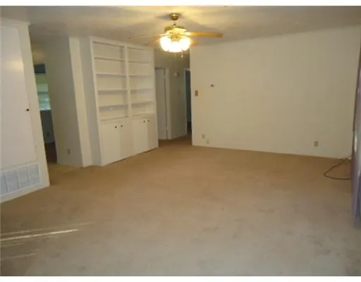 a view of a room with an empty space