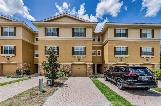 a car parked in front of a house