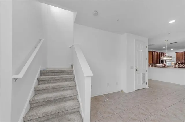 a spacious bathroom with a bathtub and shower