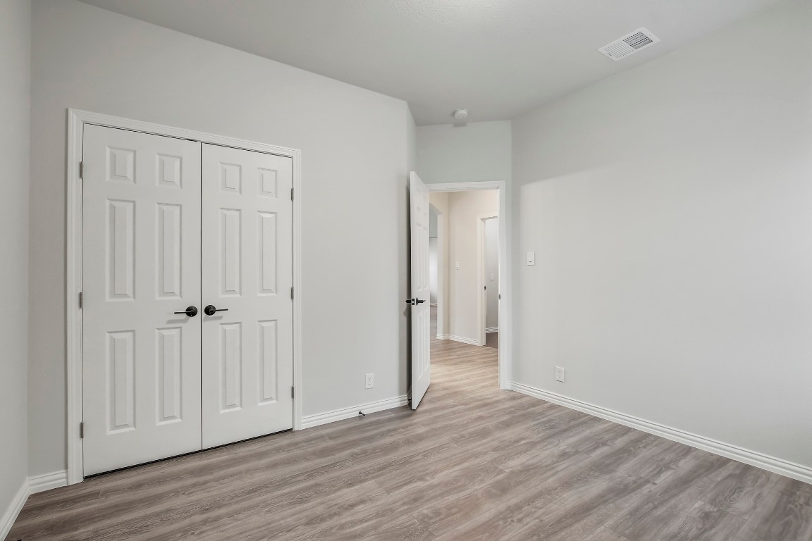 406 Dragon Ridge Road Buda, TX 78610 - Photo 36 of 39 a view of a livingroom with wooden floor
