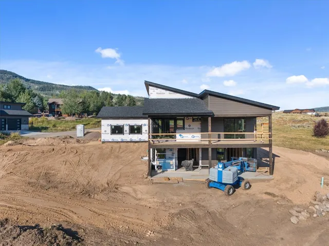 a view of a house with a ocean view