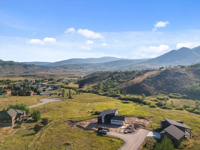 a view of a lake with mountains in the background