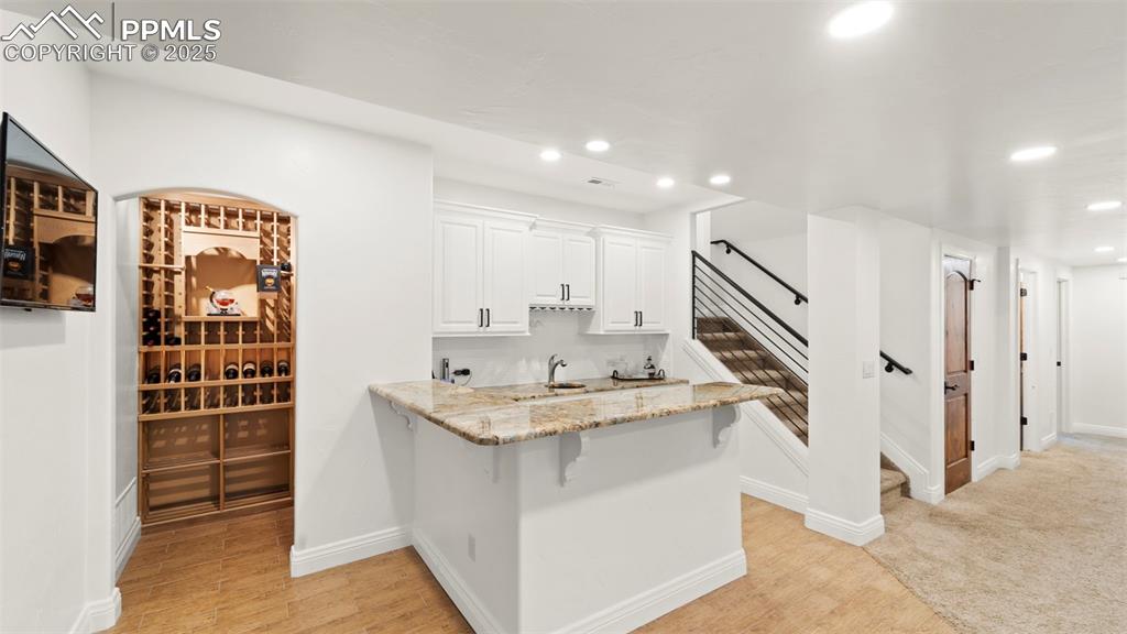 13625 Random Ridge View Colorado Springs, CO 80921 - Photo 25 of 50 a kitchen with stainless steel appliances granite countertop a sink and cabinets