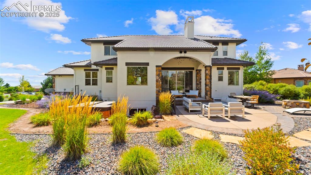 13625 Random Ridge View Colorado Springs, CO 80921 - Photo 41 of 50 a view of a house with pool and chairs