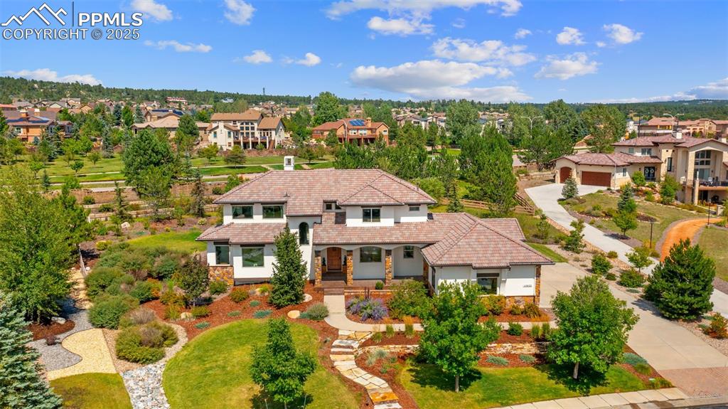 13625 Random Ridge View Colorado Springs, CO 80921 - Photo 45 of 50 a aerial view of a house with a yard