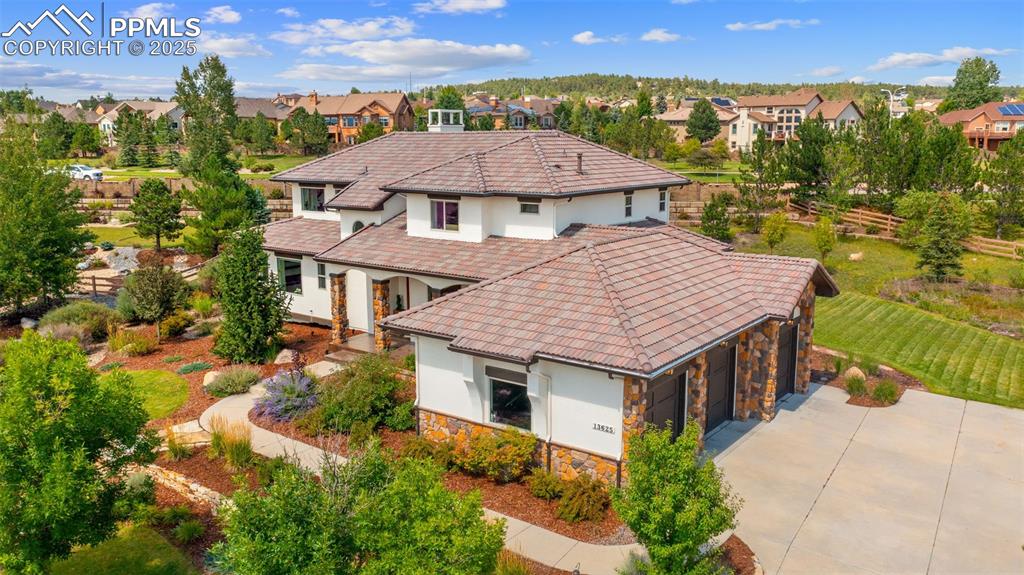 13625 Random Ridge View Colorado Springs, CO 80921 - Photo 50 of 50 an aerial view of a house with a yard and balcony