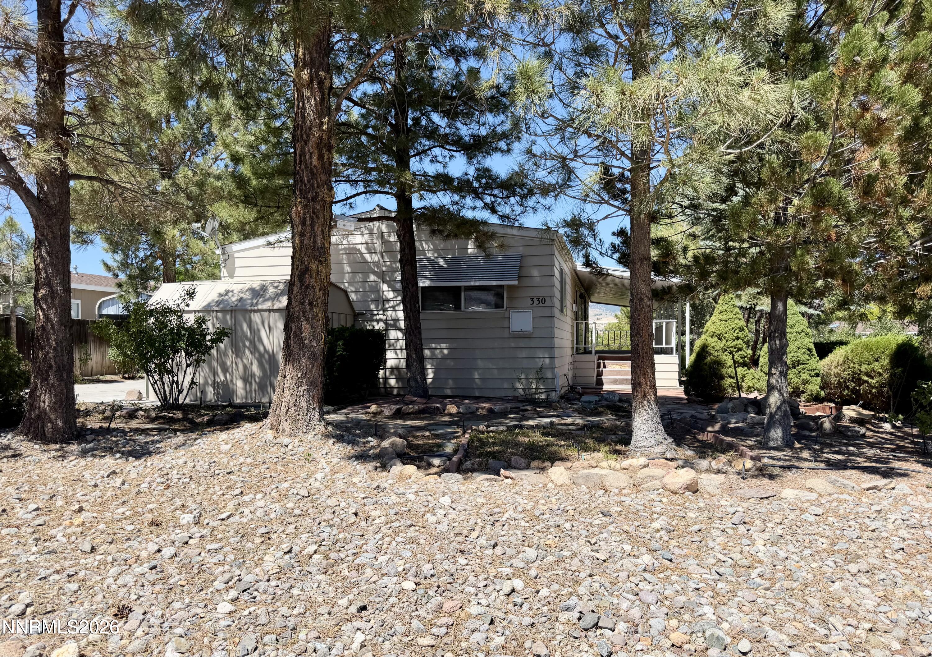 330 Taurus Circle Reno, NV 89521 - Photo 26 of 27 a view of a house with a yard covered in snow