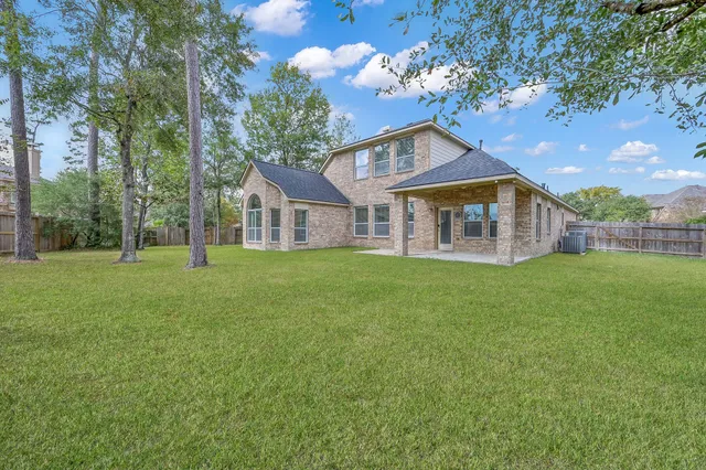 a porch with yard and outdoor seating