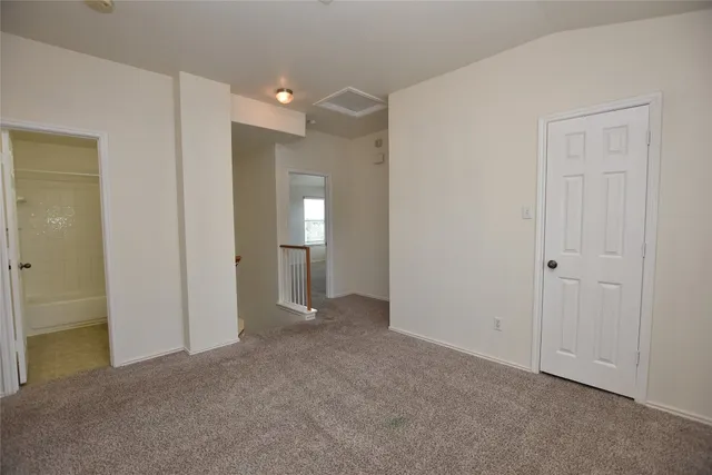 a view of empty room with windows